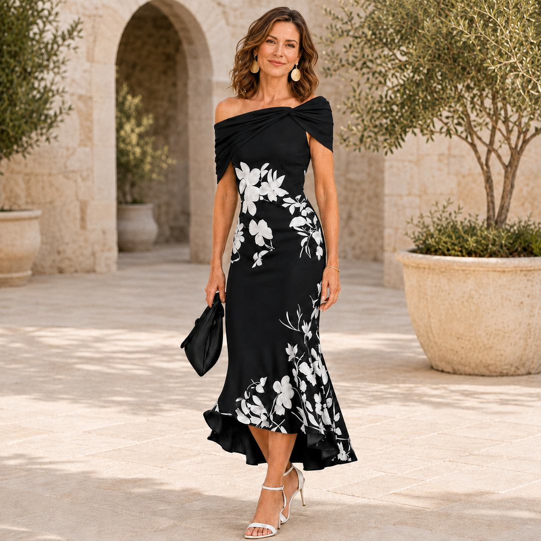 Flora Contour Floral Midi Dress by Bennett and Lowe, featuring a fitted waist, flowing skirt, and vibrant floral print.