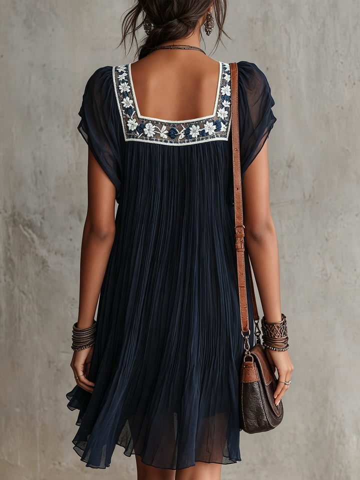Apolline | Navy Floral Pleated Mini Dress